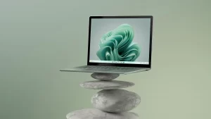 Surface-Laptop-5-silver-on-rocks.jpg
